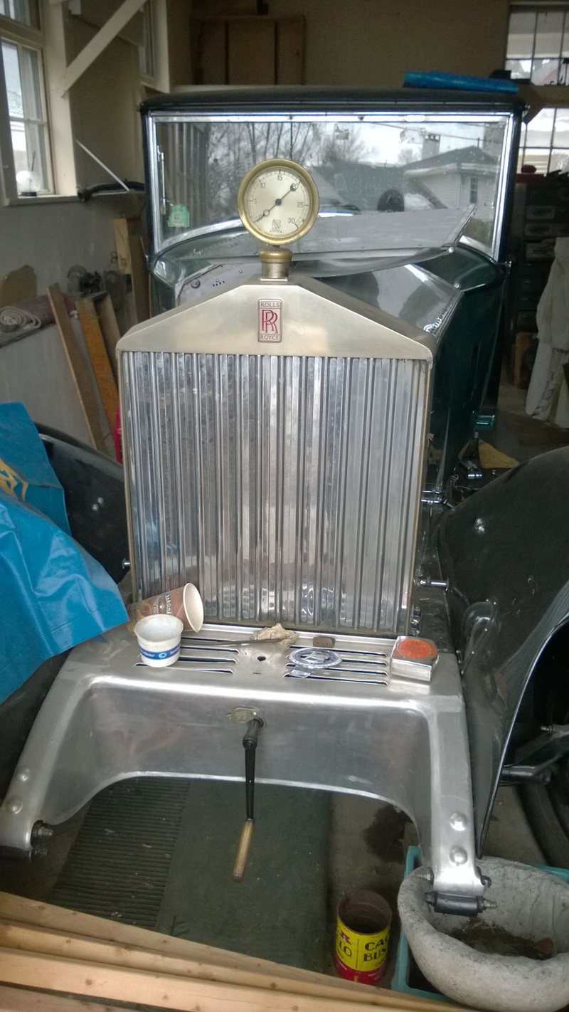 Illustration for article titled In which we take a 450 mile road trip in the boss's Tesla, learn some things about book binding and look at a pre-war Rolls Royce 20/25HP that is for sale...
